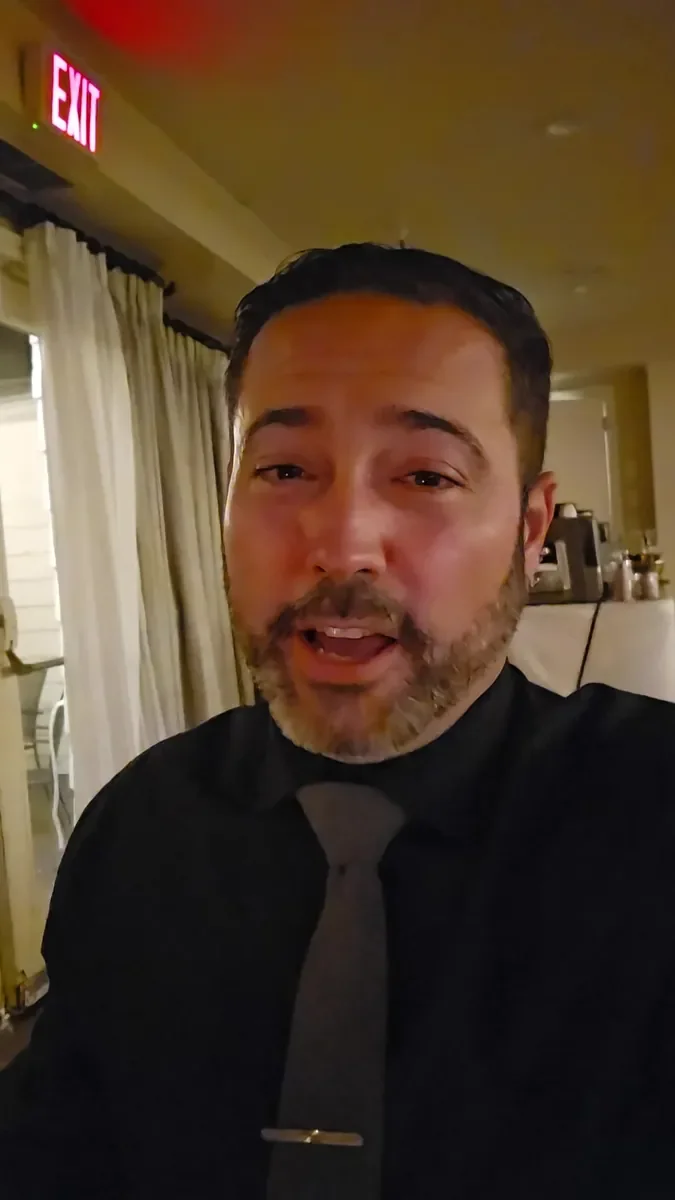 Michael Sage, Westport wedding DJ and MC, taking a selfie inside a reception venue